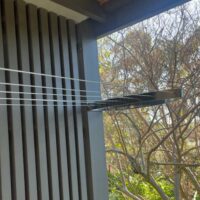 Corner Clothesline Post to Wall - Image 2