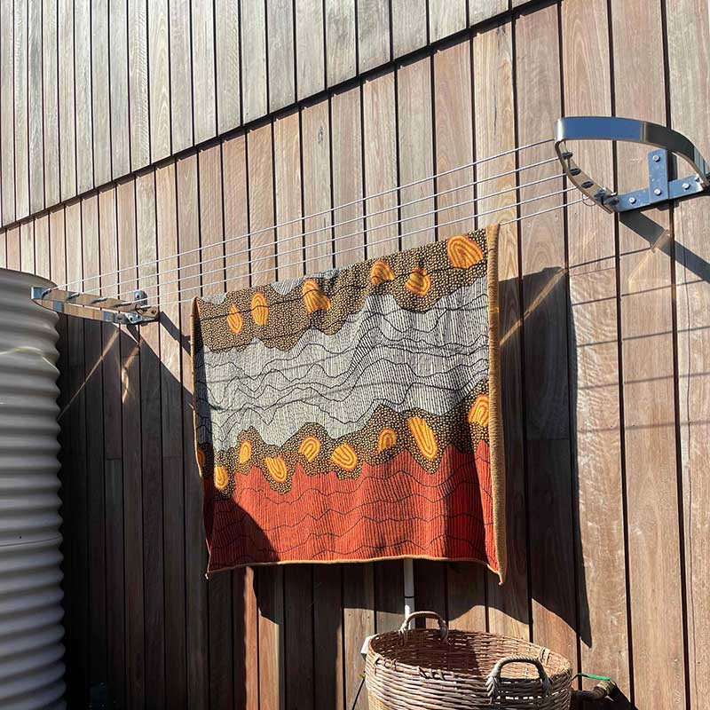 contemporary stainless steel clothesline for timber coastal home